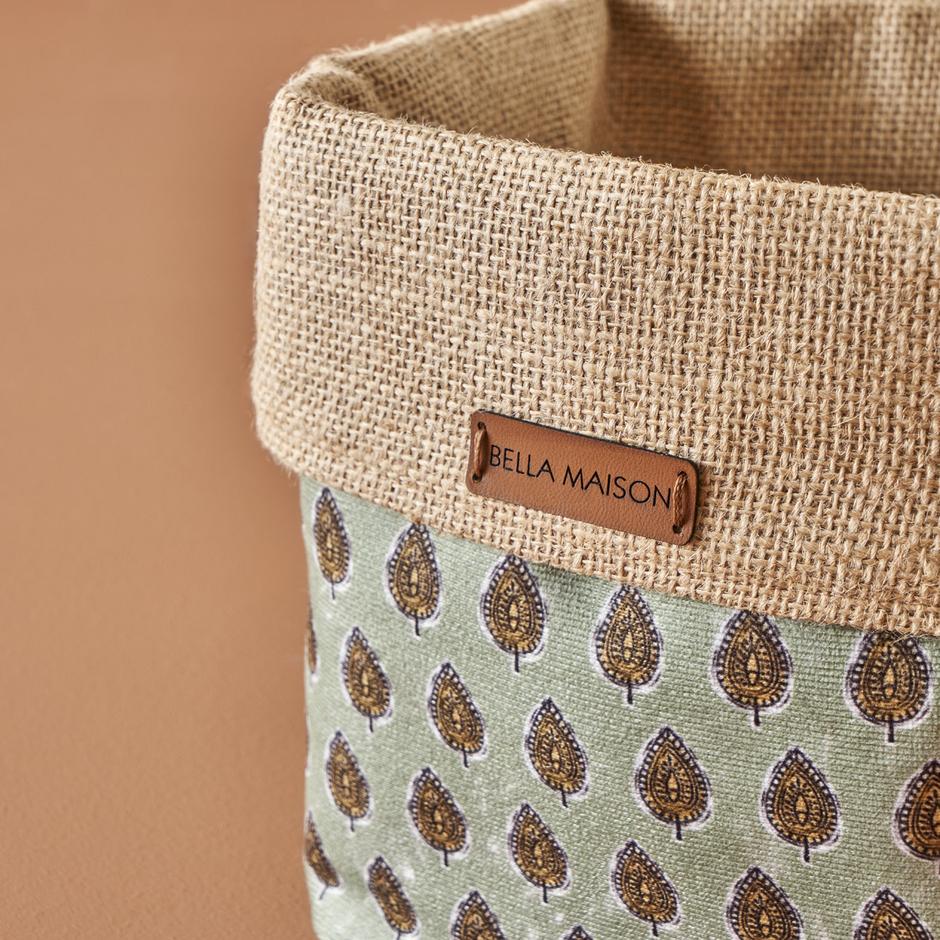 Close-up of Durable Plastic Green Storage Basket with Handles