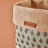 Close-up of Durable Plastic Green Storage Basket with Handles